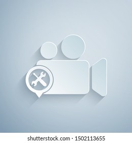 Paper cut Video camera with screwdriver and wrench icon isolated on grey background. Adjusting, service, setting, maintenance, repair, fixing. Paper art style. Vector Illustration
