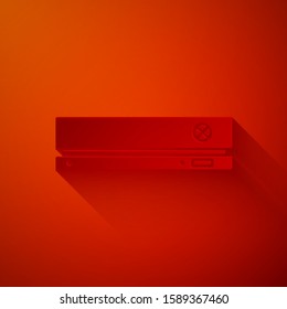 Paper cut Video game console icon isolated on red background. Paper art style. Vector Illustration