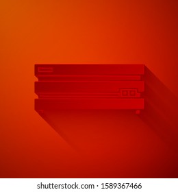 Paper cut Video game console icon isolated on red background. Paper art style. Vector Illustration