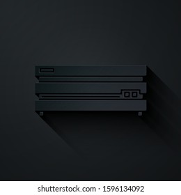 Paper cut Video game console icon isolated on black background. Paper art style. Vector Illustration