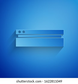 Paper cut Video game console icon isolated on blue background. Paper art style. Vector Illustration