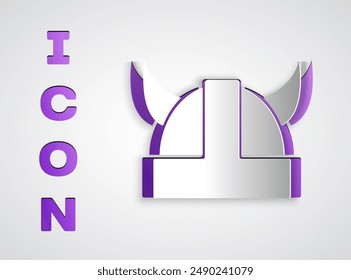 Paper cut Viking in horned helmet icon isolated on grey background. Paper art style. Vector