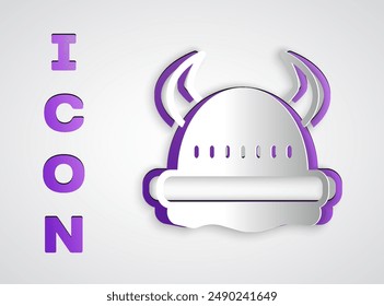 Paper cut Viking in horned helmet icon isolated on grey background. Paper art style. Vector