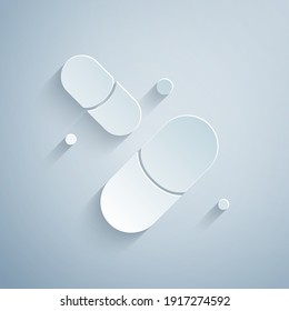 Paper cut Vitamin complex of pill capsule icon isolated on grey background. Healthy lifestyle. Paper art style. Vector.