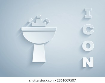 Paper cut Washbasin with water tap icon isolated on grey background. Paper art style. Vector