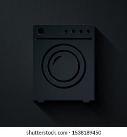 Paper cut Washer icon isolated on black background. Washing machine icon. Clothes washer - laundry machine. Home appliance symbol. Paper art style. Vector Illustration