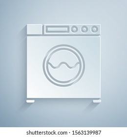 Paper cut Washer icon isolated on grey background. Washing machine icon. Clothes washer - laundry machine. Home appliance symbol. Paper art style. Vector Illustration