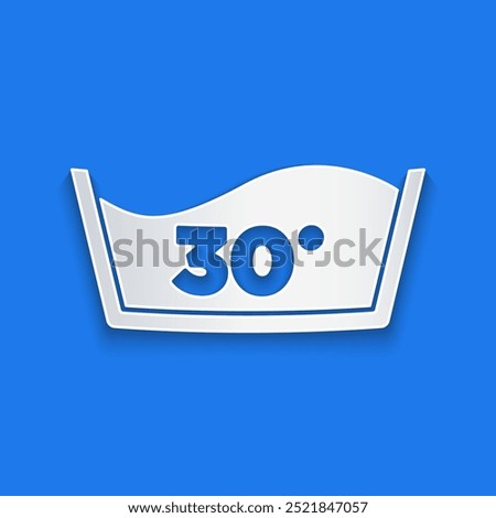Paper cut Washing under 30 degrees celsius icon isolated on blue background. Temperature wash. Paper art style. Vector