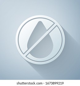 Paper cut Water drop forbidden icon isolated on grey background. No water sign. Paper art style. Vector Illustration
