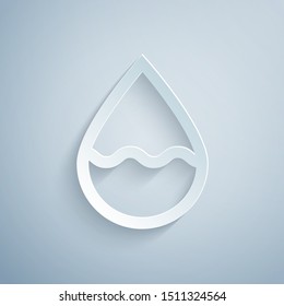 Paper cut Water drop icon isolated on grey background. Paper art style. Vector Illustration