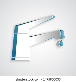Paper cut Water tap with a falling water drop icon isolated on grey background. Paper art style. Vector Illustration