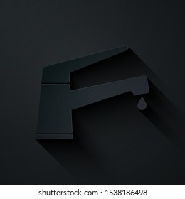 Paper cut Water tap with a falling water drop icon isolated on black background. Paper art style. Vector Illustration