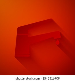 Paper cut Water tap with a falling water drop icon isolated on red background. Paper art style. Vector Illustration
