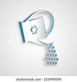 Paper cut Watering can icon isolated on grey background. Irrigation symbol. Paper art style. Vector Illustration