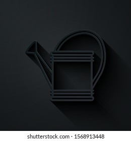 Paper cut Watering can icon isolated on black background. Irrigation symbol. Paper art style. Vector Illustration