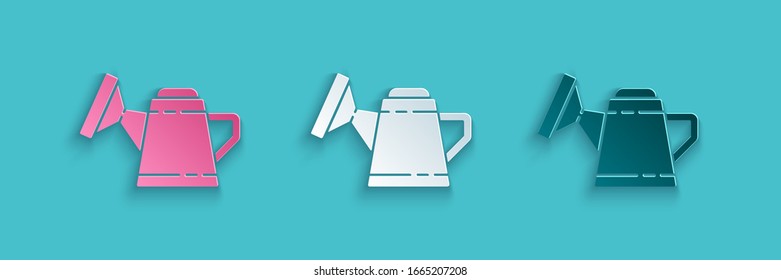 Paper cut Watering can icon isolated on blue background. Irrigation symbol. Paper art style. Vector Illustration