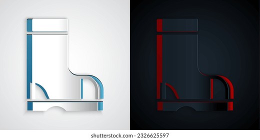 Recorte de papel Icono de funda de goma impermeable aislado en fondo gris y negro. Botas para el tiempo lluvioso, pesca, jardinería. Estilo de arte de papel. Vector