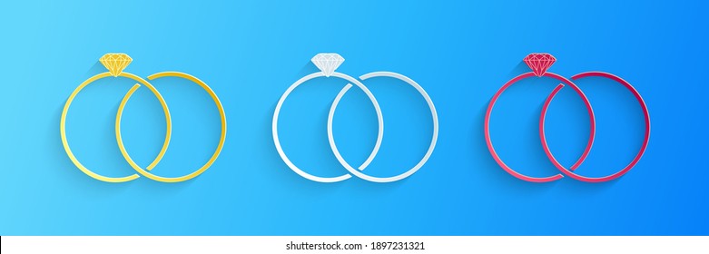 Paper cut Wedding rings icon isolated on blue background. Bride and groom jewelery sign. Marriage icon. Diamond ring. Paper art style. Vector.