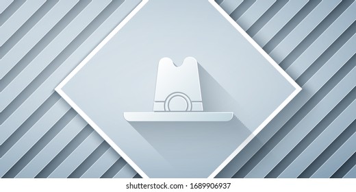Paper cut Western cowboy hat icon isolated on grey background. Paper art style. Vector Illustration