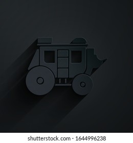 Paper cut Western stagecoach icon isolated on black background. Paper art style. Vector Illustration