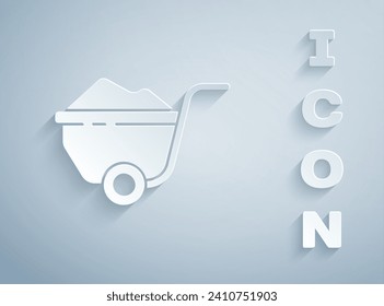 Paper cut Wheelbarrow with dirt icon isolated on grey background. Tool equipment. Agriculture cart wheel farm. Paper art style. Vector Illustration