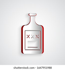 Paper cut Whiskey bottle icon isolated on grey background. Paper art style. Vector Illustration
