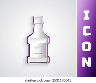 Paper cut Whiskey bottle icon isolated on grey background. Paper art style. Vector