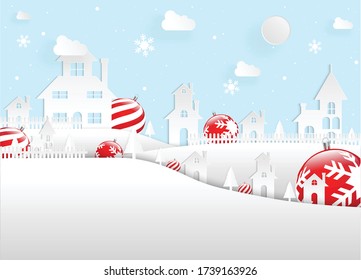 Paper cut in white theme. White Christmas on pastel blue background. Red ornaments.