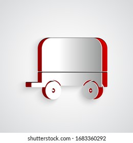 Paper cut Wild west covered wagon icon isolated on grey background. Paper art style. Vector Illustration