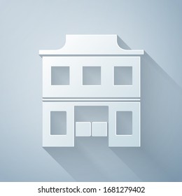 Paper cut Wild west saloon icon isolated on grey background. Old west building. Paper art style. Vector Illustration