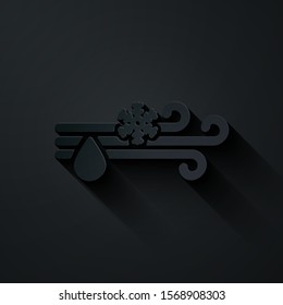 Paper cut Wind and rain with snow icon isolated on black background. Windy weather. Paper art style. Vector Illustration