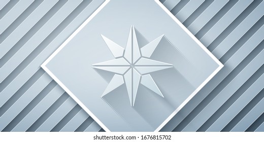 Paper cut Wind rose icon isolated on grey background. Compass icon for travel. Navigation design. Paper art style. Vector Illustration