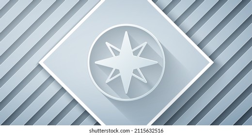 Paper cut Wind rose icon isolated on grey background. Compass icon for travel. Navigation design. Paper art style. Vector