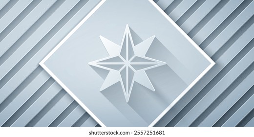 Paper cut Wind rose icon isolated on grey background. Compass icon for travel. Navigation design. Paper art style. Vector