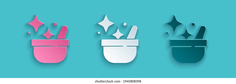 Paper cut Witch cauldron icon isolated on blue background. Happy Halloween party. Paper art style. Vector