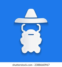 Paper cut Wizard warlock icon isolated on blue background. Paper art style. Vector