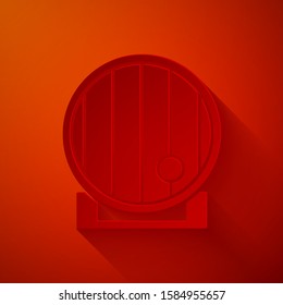 Paper cut Wooden barrel icon isolated on red background. Alcohol barrel, drink container, wooden keg for beer, whiskey, wine. Paper art style. Vector Illustration