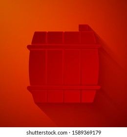 Paper cut Wooden barrel icon isolated on red background. Alcohol barrel, drink container, wooden keg for beer, whiskey, wine. Paper art style. Vector Illustration