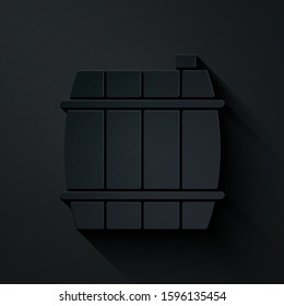 Paper cut Wooden barrel icon isolated on black background. Alcohol barrel, drink container, wooden keg for beer, whiskey, wine. Paper art style. Vector Illustration