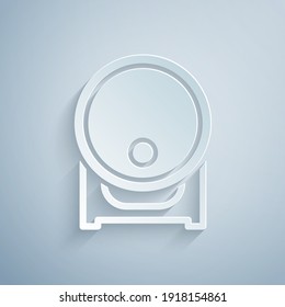 Paper cut Wooden barrel on rack with stopcock icon isolated on grey background. Paper art style. Vector.
