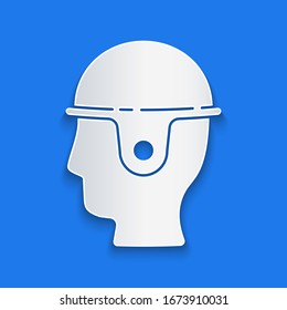Paper cut Worker safety helmet icon isolated on blue background. Paper art style. Vector Illustration