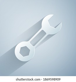 Paper cut Wrench spanner icon isolated on grey background. Paper art style. Vector