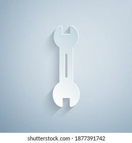 Paper cut Wrench spanner icon isolated on grey background. Paper art style. Vector.