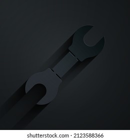 Paper cut Wrench spanner icon isolated on black background. Paper art style. Vector Illustration