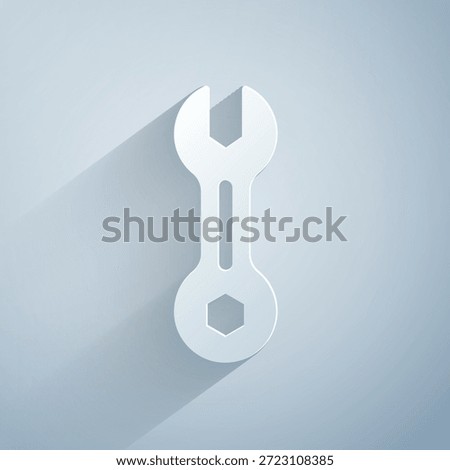 Paper cut Wrench spanner icon isolated on grey background. Paper art style. Vector