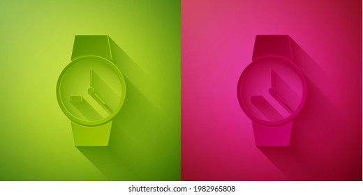 Icono de reloj de pulsera de corte de papel aislado en fondo verde y rosa. Icono de reloj de pulsera. Estilo de arte de papel. Ilustración vectorial