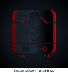 Paper cut X-ray machine icon isolated on black background. Paper art style. Vector Illustration
