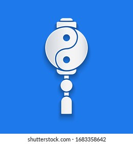 Paper cut Yin Yang symbol of harmony and balance icon isolated on blue background. Paper art style. Vector Illustration