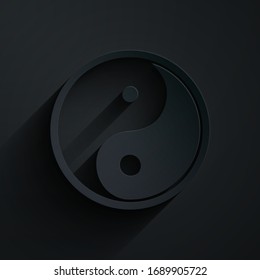 Paper cut Yin Yang symbol of harmony and balance icon isolated on black background. Paper art style. Vector Illustration