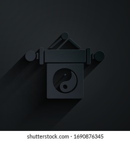 Paper cut Yin Yang symbol of harmony and balance icon isolated on black background. Paper art style. Vector Illustration